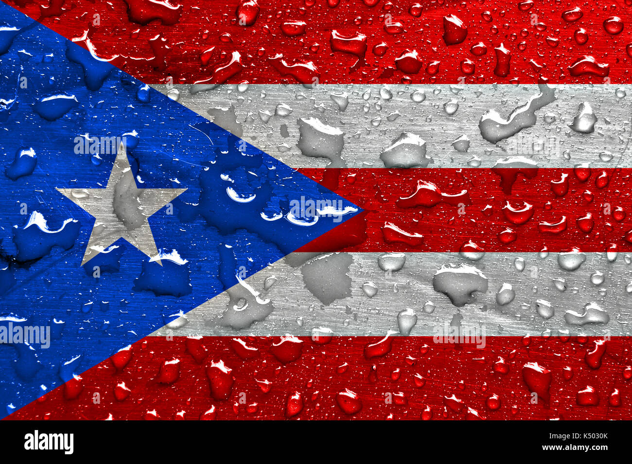 Flagge Puerto Rico mit Regentropfen Stockfoto