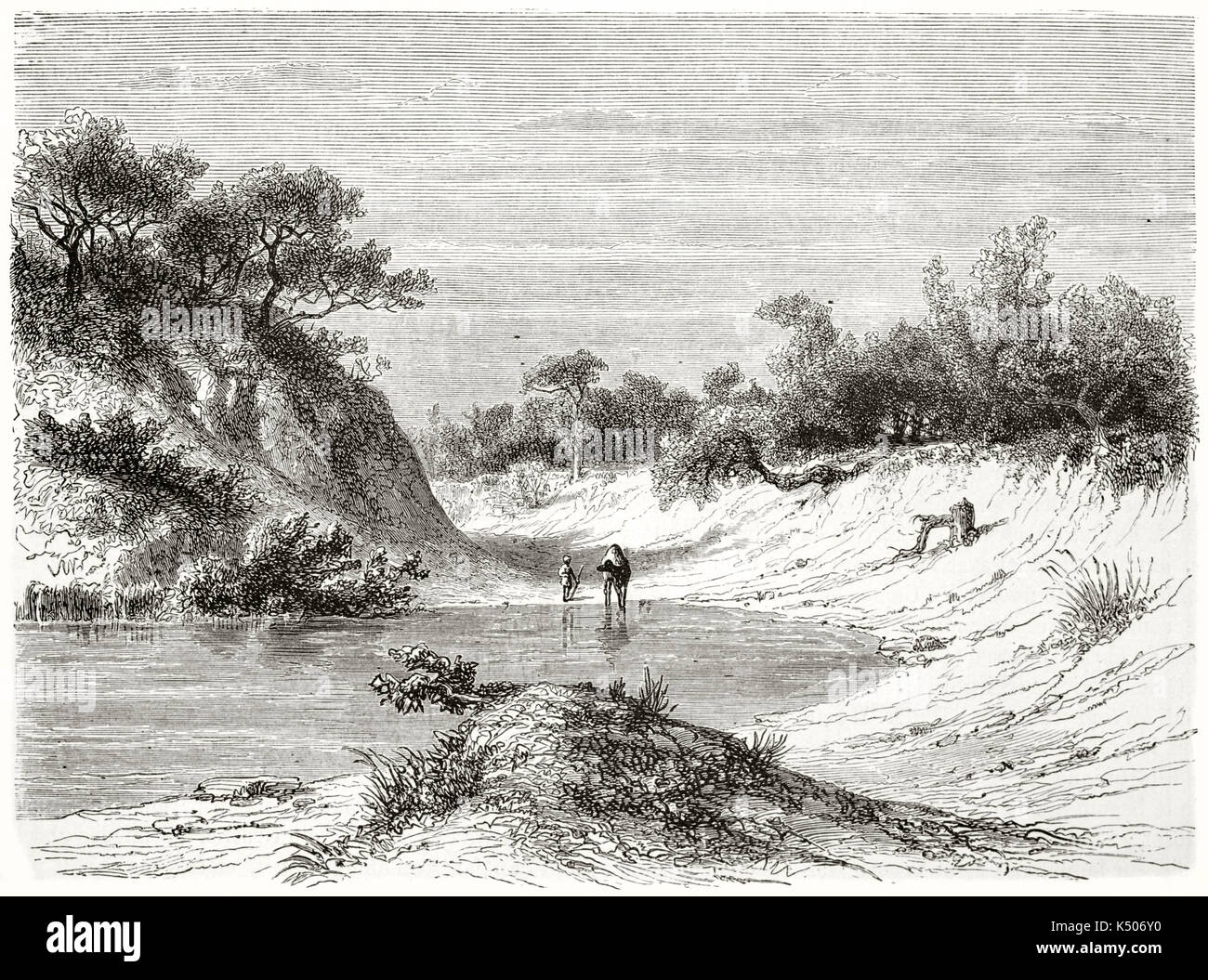 Alte Ansicht von rahad Fluss Sudan, das Flussbett ist fast trocken und ein Kamel trinken das Wasser, durch die Wüste Vegetation umgeben. Von Girardet nach Lejean auf Le Tour du Monde Paris 1862 veröffentlicht erstellt Stockfoto