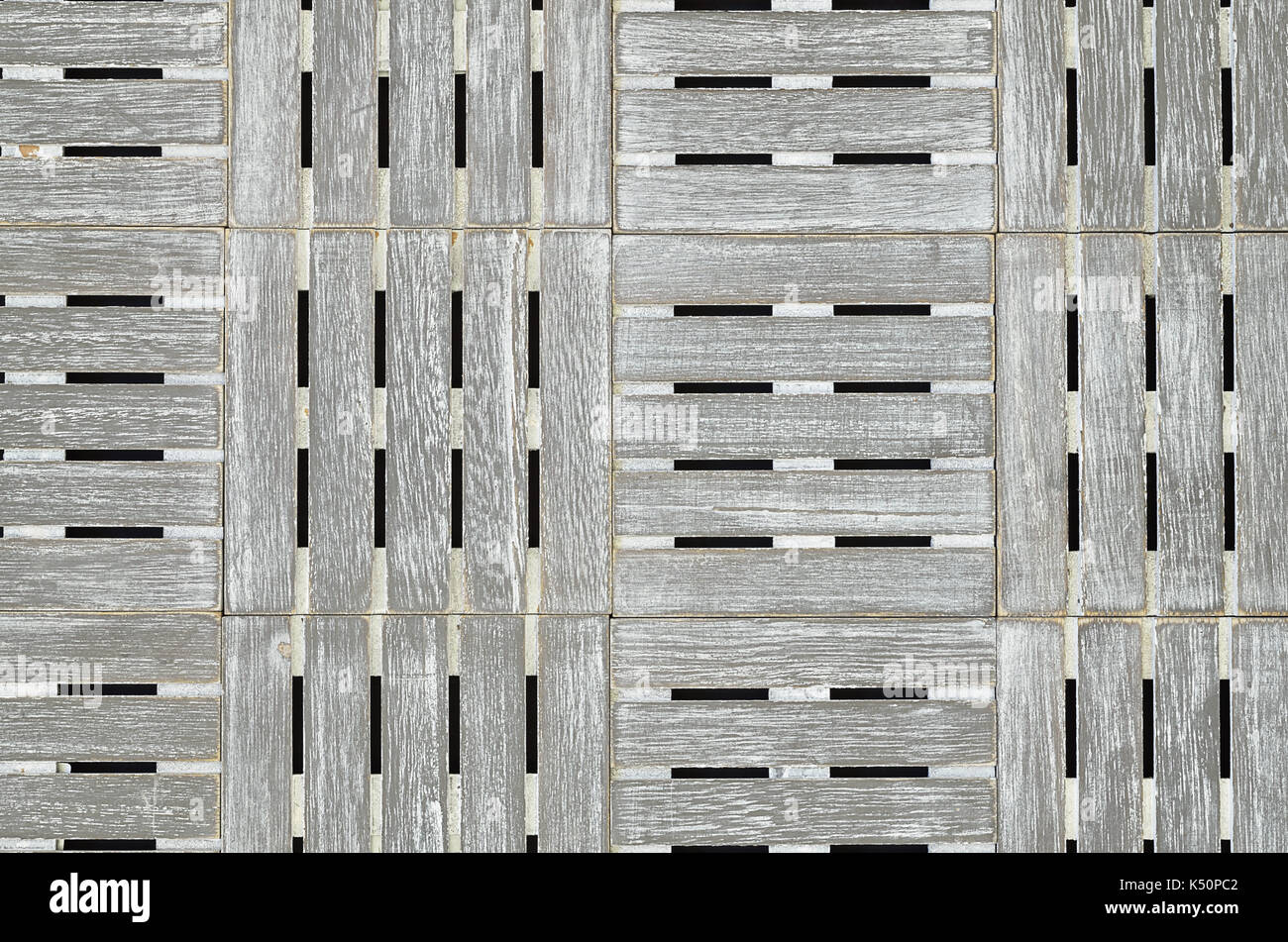 Nahaufnahme eines grauen Holzwürfel Muster Hintergrund, Vollbild, Flach, horizontal Stockfoto