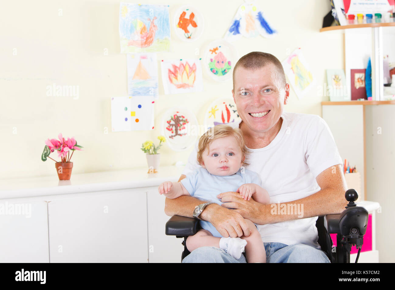 Behinderte Menschen mit kleinen Sohn Stockfoto