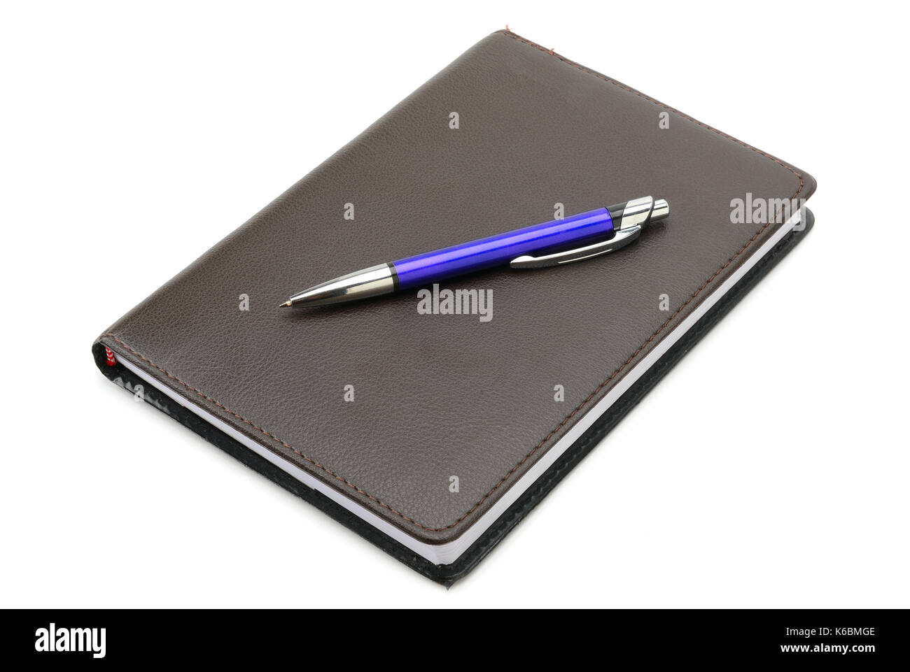Notebook und Stift auf weißem Hintergrund Stockfoto