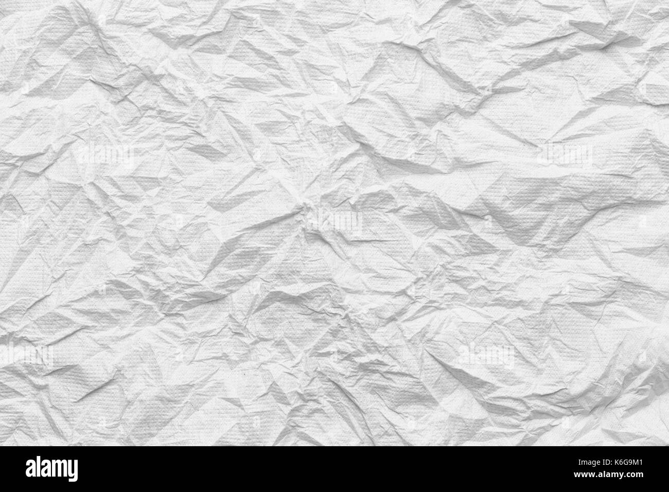 weiße Gewebeoberfläche Falten oder faltig für die Gestaltung Textur Hintergrund. Stockfoto