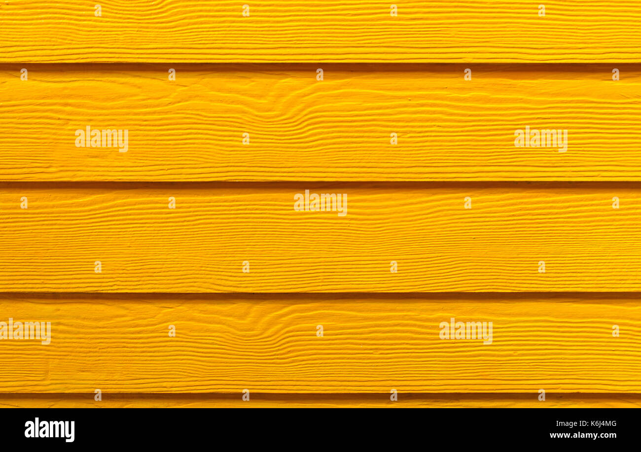 Orange Holzwand bacground Stockfoto