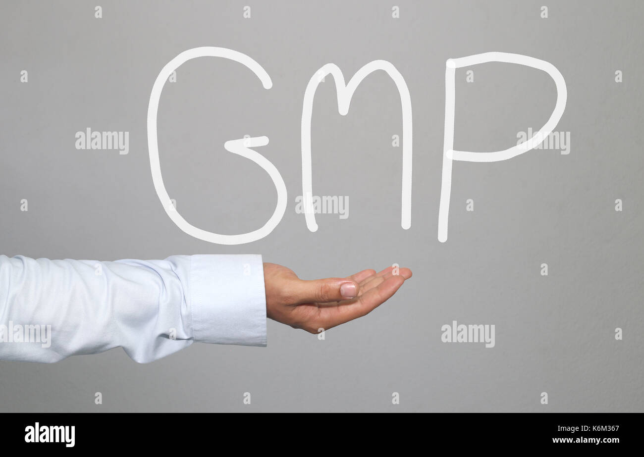 Hand der Geschäftsmann und Hand gezeichnet Text GMP-system für die Idee der Präsentation in Ihrem Unternehmen und Arbeiten. Stockfoto