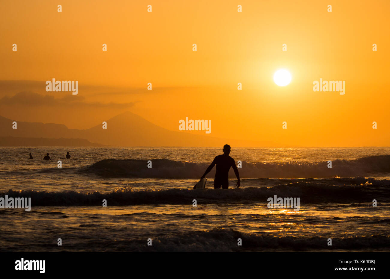 Bei Sonnenuntergang Surfer Stockfoto