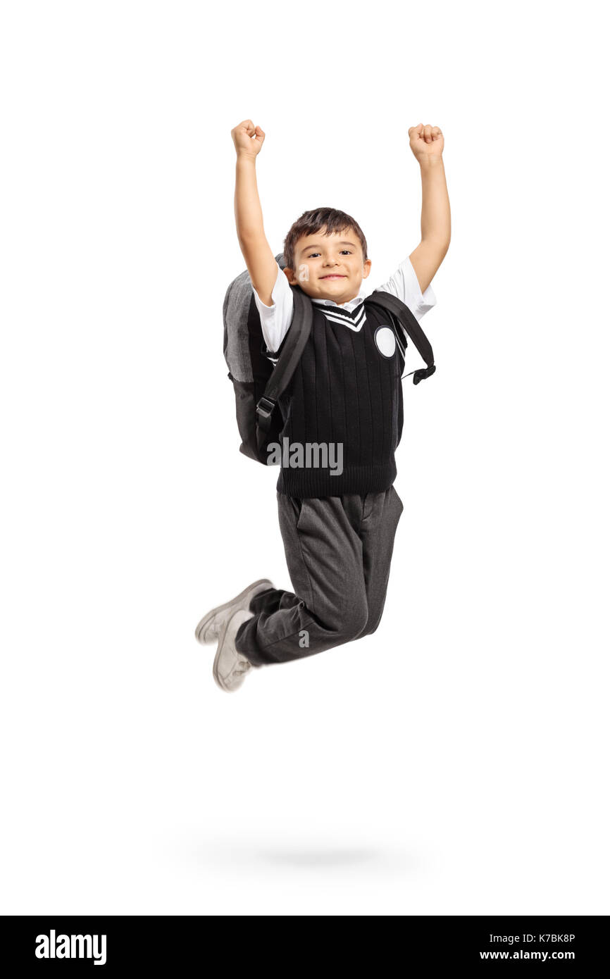 Überglücklich Schüler springen und gestikulierend Glück auf weißem Hintergrund Stockfoto