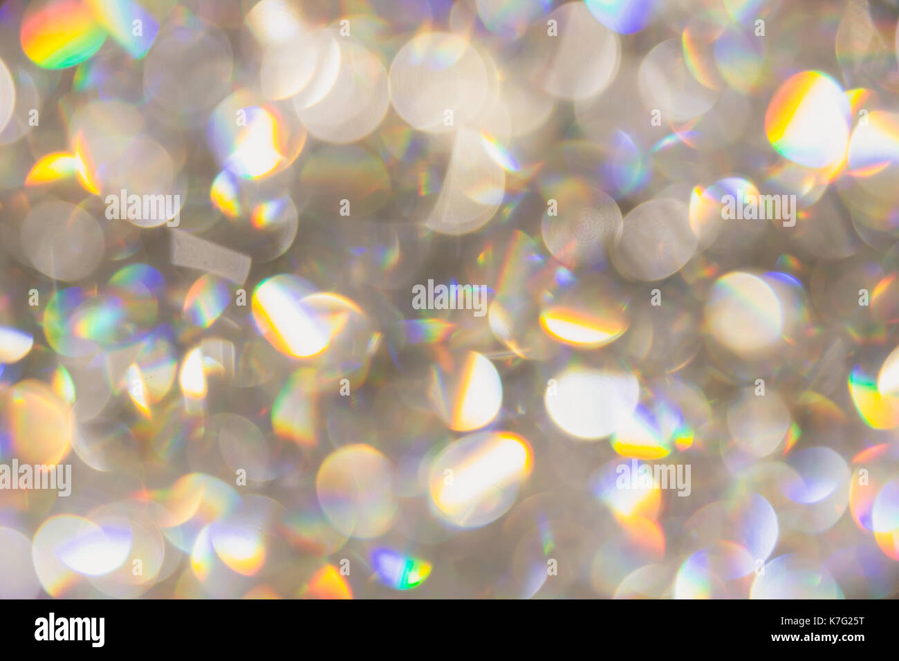 Blur Bokeh des Lichts Pearl diamond Rainbow bunte Helligkeit reflektieren Hintergrund. Stockfoto