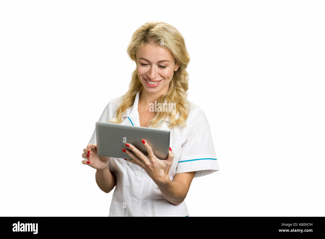 Porträt der glückliche junge Krankenschwester mit pc Tablet. Stockfoto