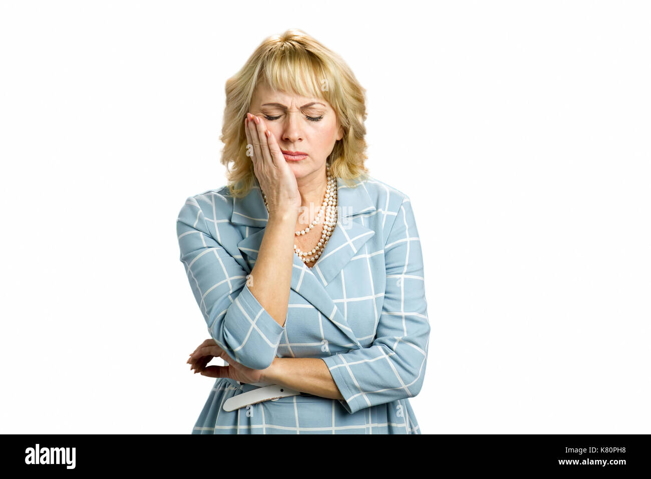 Frau mittleren Alters leiden unter Zahnschmerzen. Stockfoto
