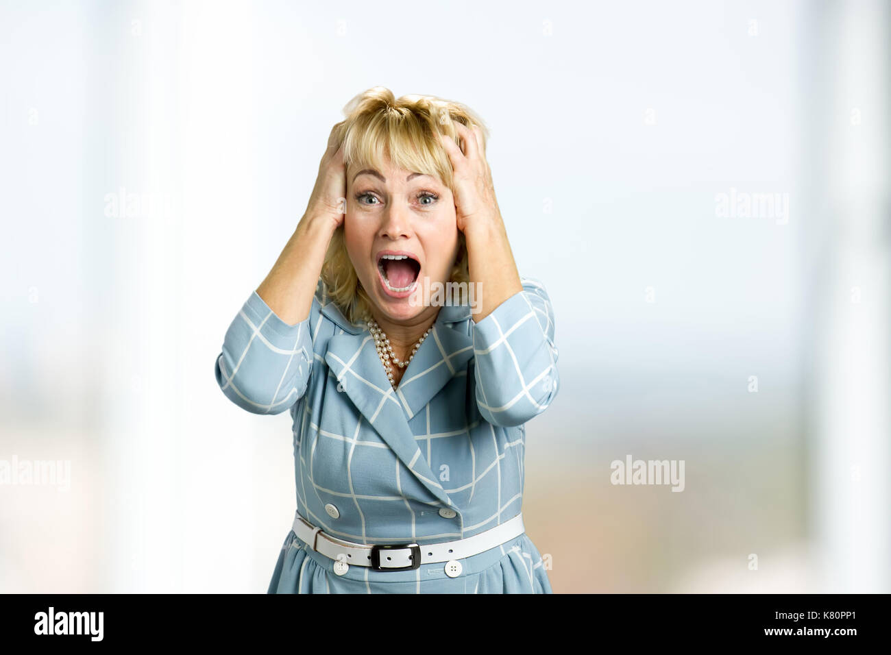 Gerne reife Frau in Aufregung. Stockfoto