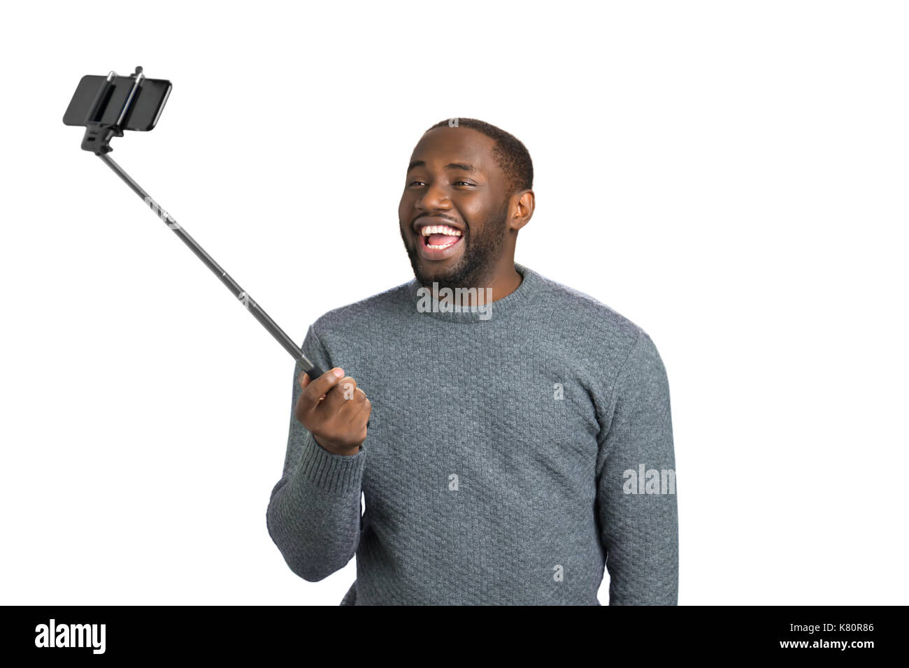 Glückliche junge Mann unter selfie. Stockfoto