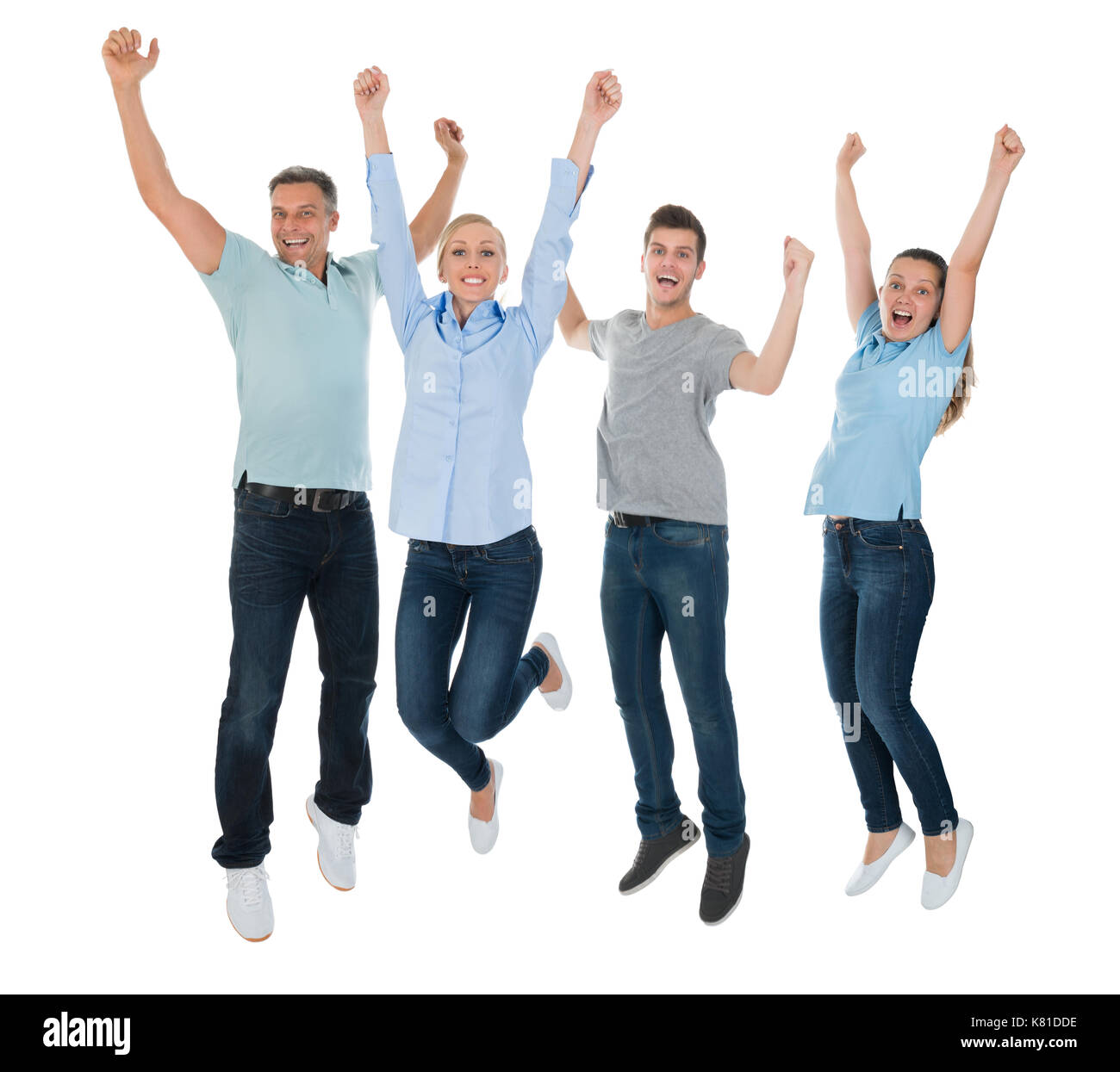 Gruppe der Aufgeregte Leute springen auf weißem Hintergrund Stockfoto