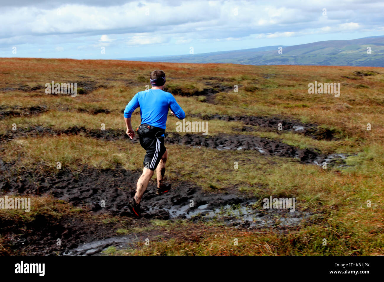 Querformat von Fiel runner Kreuzung wüst Moorland Stockfoto