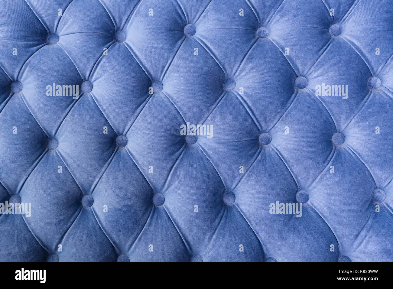 Blauen Stoff sofa Textur mit Tasten für Hintergrund und Design. Stockfoto