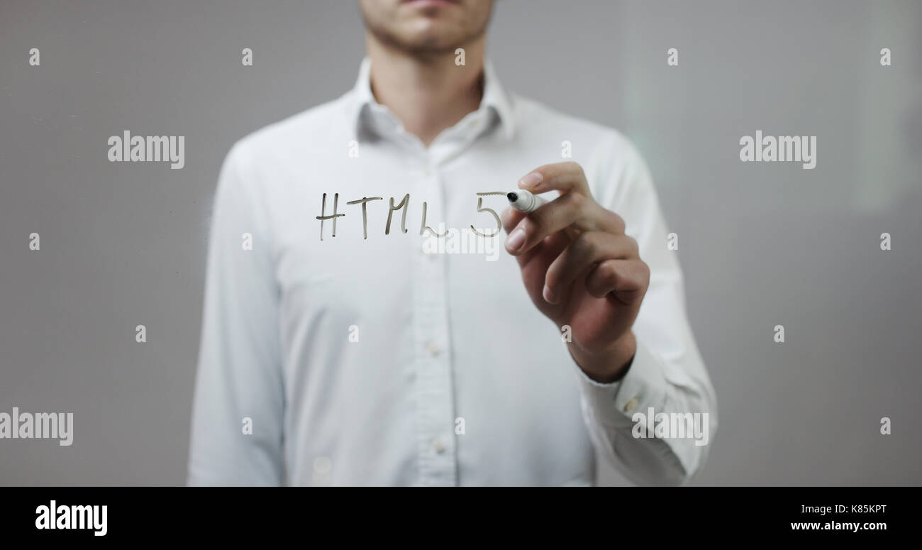 Html5, Mann schreiben auf Glas Stockfoto