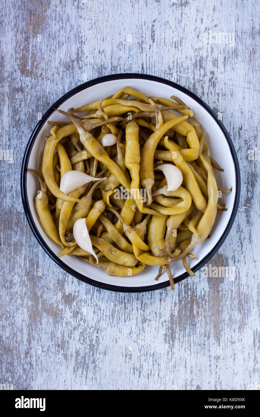 Eingelegter grüner Pfeffer Stockfoto