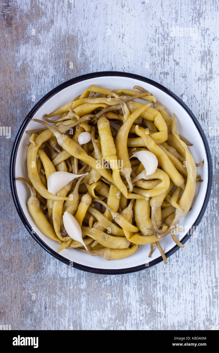 Eingelegter grüner Pfeffer Stockfoto