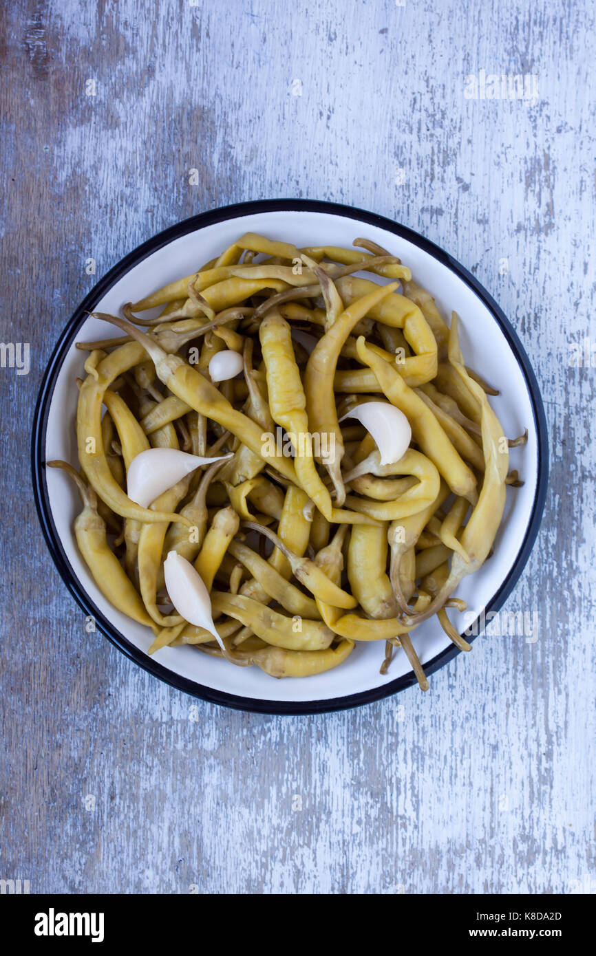 Eingelegter grüner Pfeffer Stockfoto