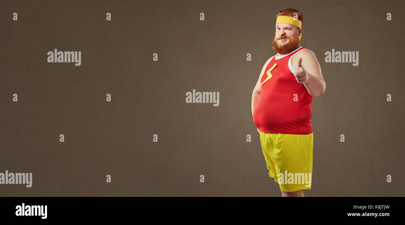 Ein dicker Mann mit Bart in einen Trainingsanzug. Stockfoto