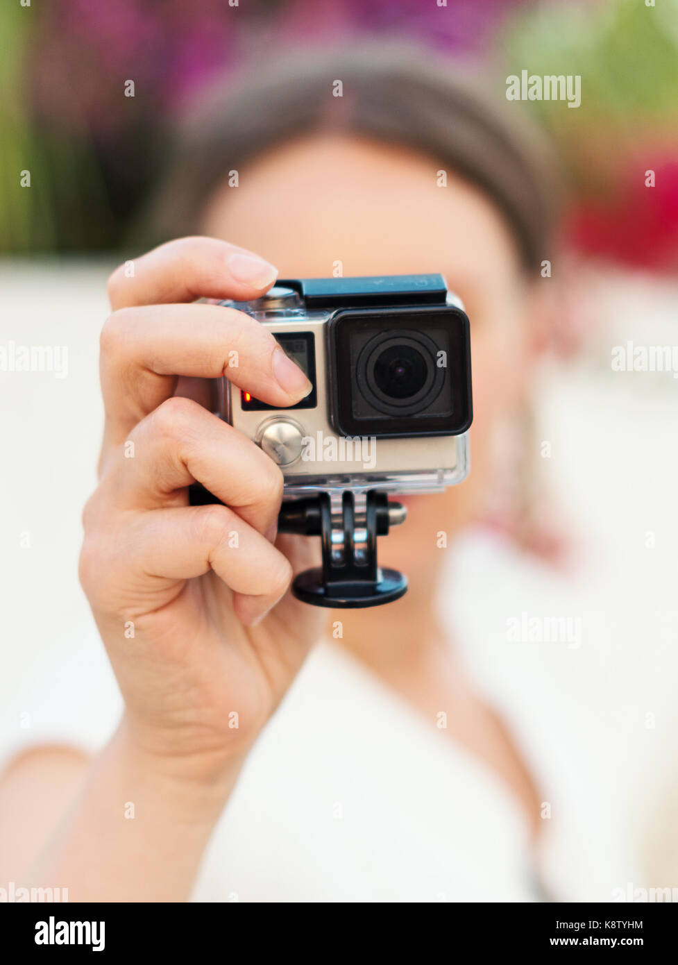 Frau schiessen mit Action Kamera. Stockfoto