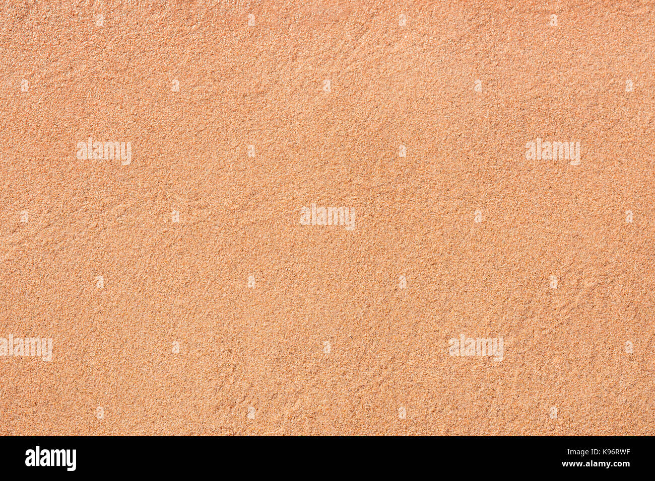 Natürlicher Sand am Strand. Hintergrund und Textur Stockfoto