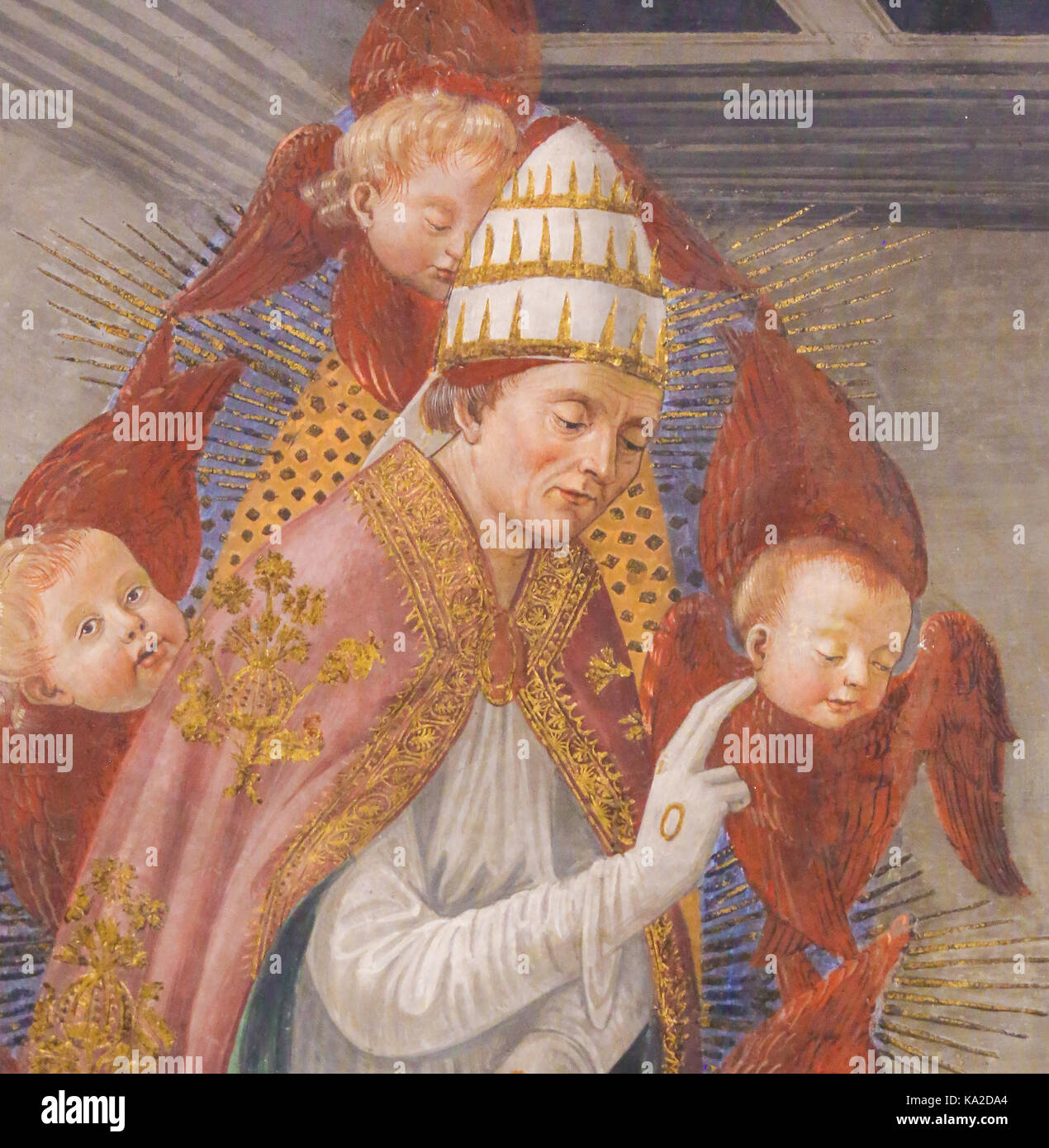 Fresko (1478) Darstellung der Hl. Gregor der Große, durch rote unterstützt - geflügelten Cherubim, in der Collegiata von San Gimignano, Italien. Stockfoto