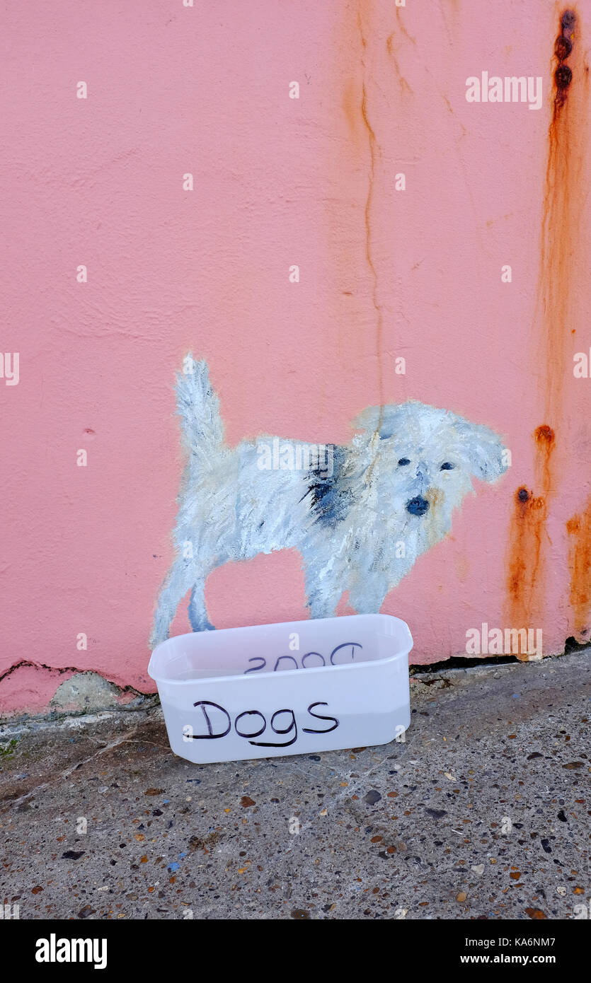 Gemälde von Terrier Hund auf rosa gestrichene Wand Stockfoto