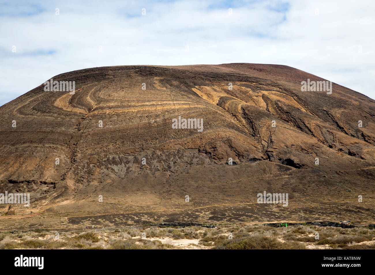 Ungewöhnliche gemustert Gesteinsschichten auf Agujas Grandes Vulkan La Isla Graciosa, Lanzarote, Kanarische Inseln, Spanien Stockfoto