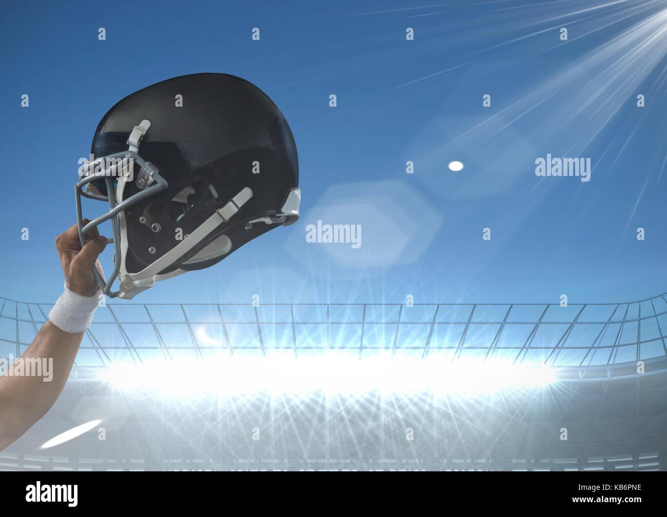 Digital composite von Arm bis Holding American football Helm Stockfoto