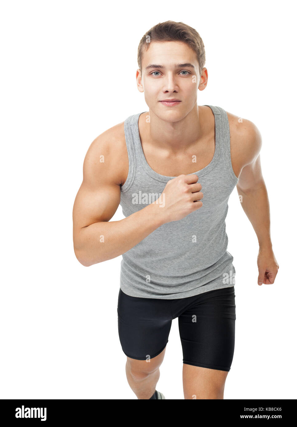 Portrait des jungen Mannes Athlet auf weißem Hintergrund läuft Stockfoto