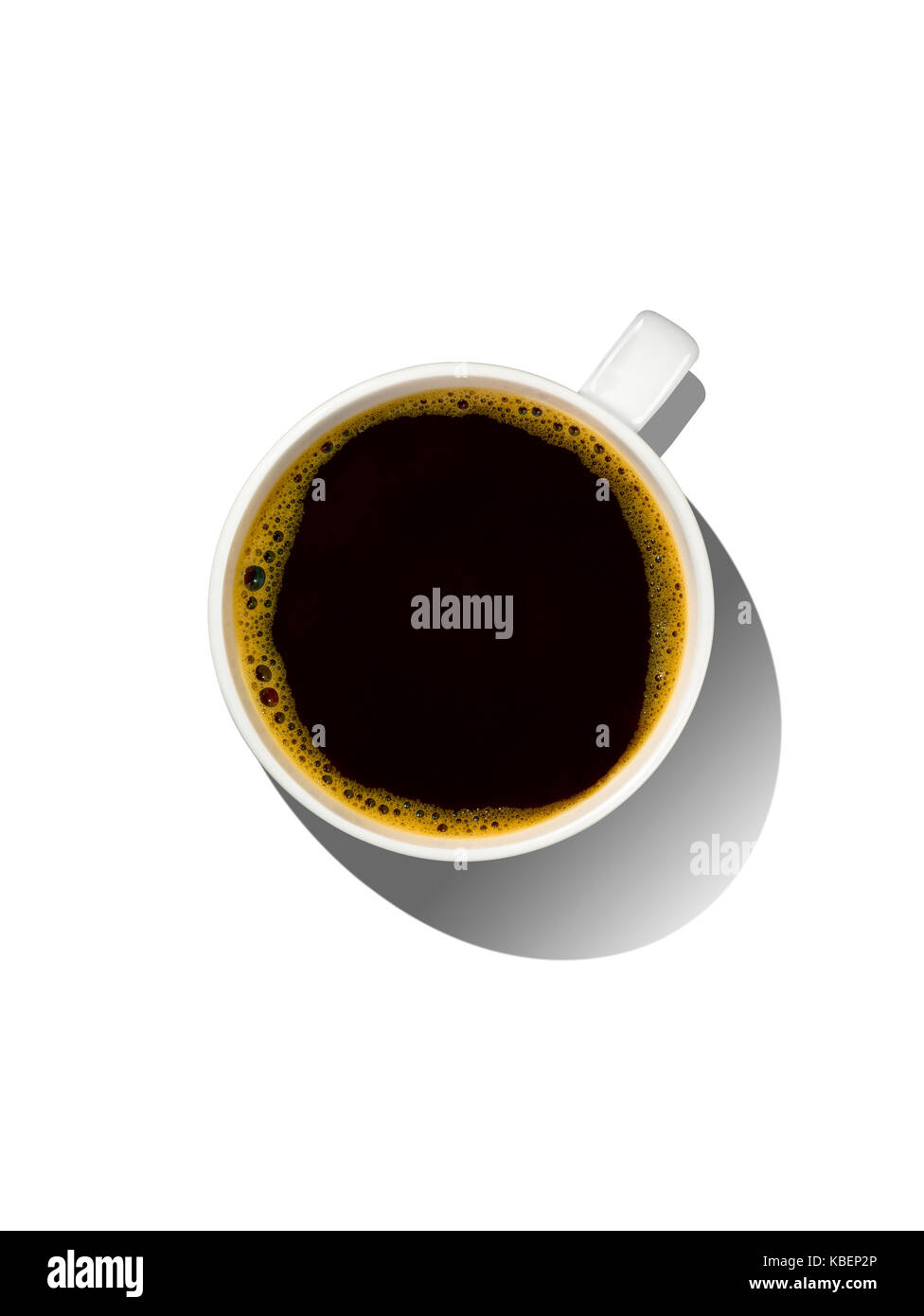 Ein overhead Shot, eine Tasse Kaffee mit Schatten Stockfoto