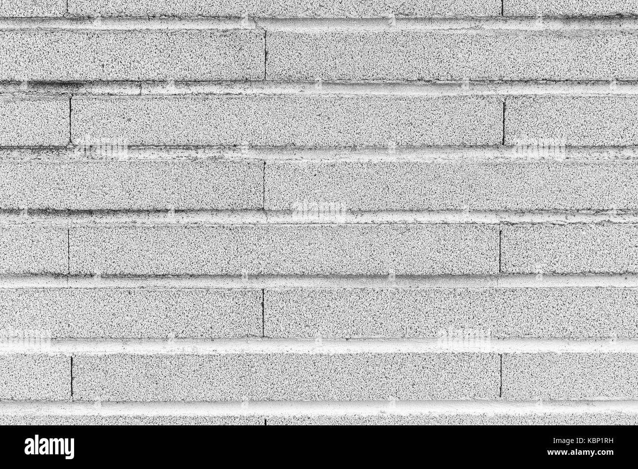 Grauer Hintergrund Simulation eine Mauer mit horizontalen Mauerwerk Stockfoto