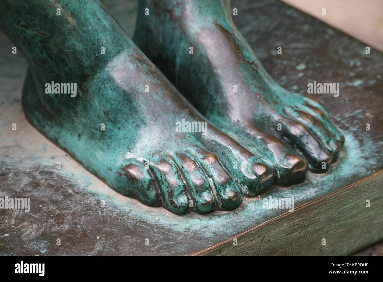 Füsse aus Bronze - Füße aus Bronze Stockfoto