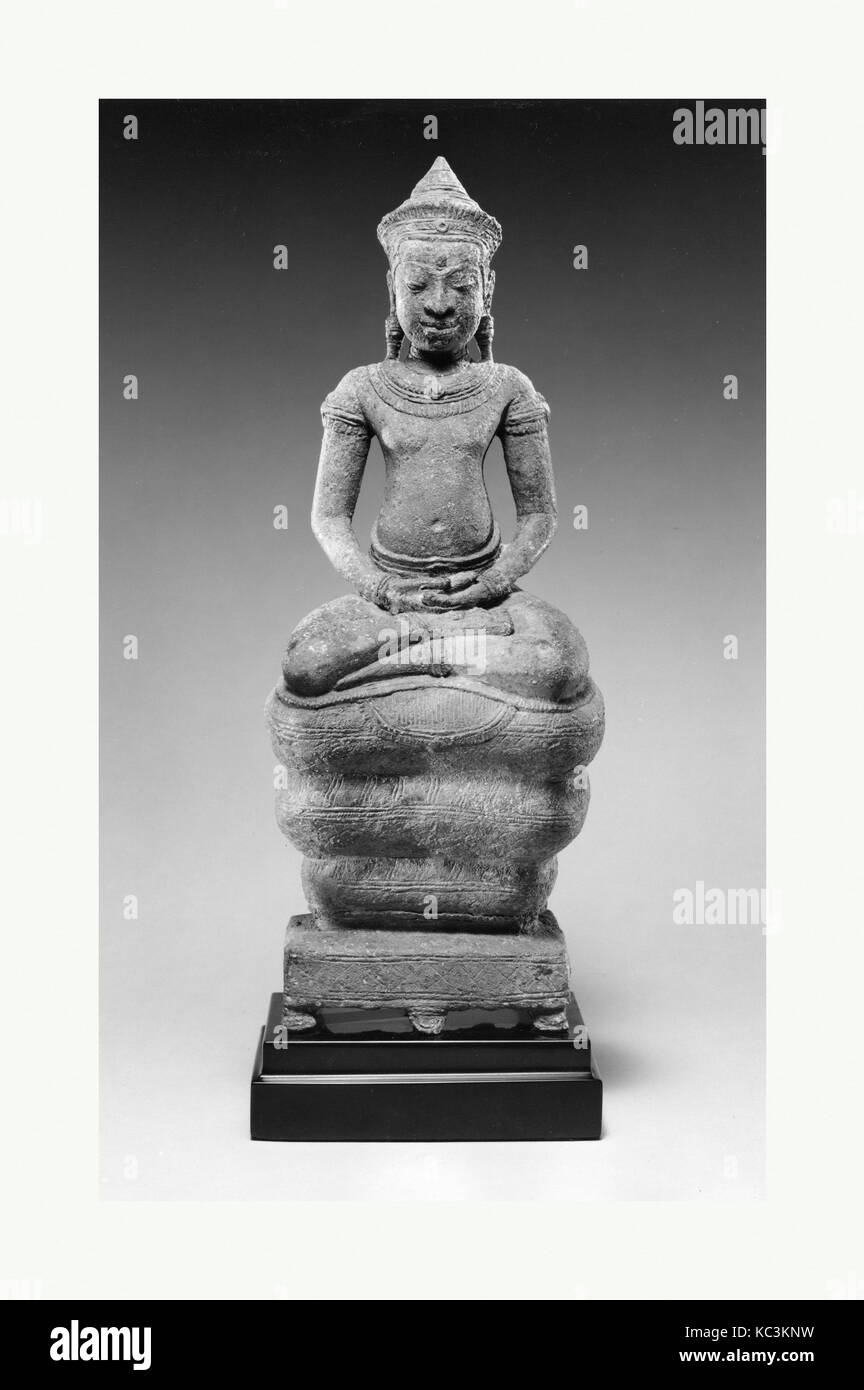 Buddha sitzt auf der Windungen einer Naga, Ende 12. Jahrhundert Stockfoto