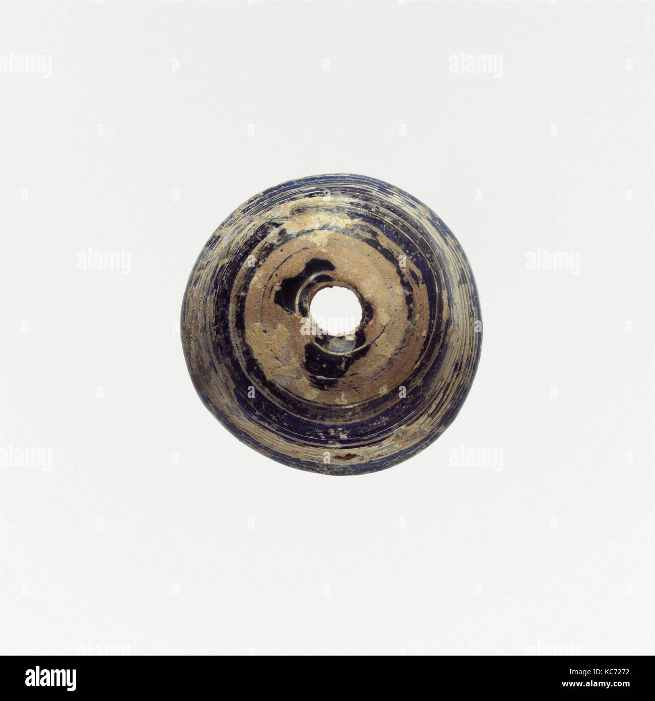 Glas Spindel Wirtel, Imperial, Ca. 1 St - 2. Jh. N.CHR., Römische, Glas; rod-gebildet und Wunde, Höhe: 1,1 cm. (1.1 cm), Glas Stockfoto