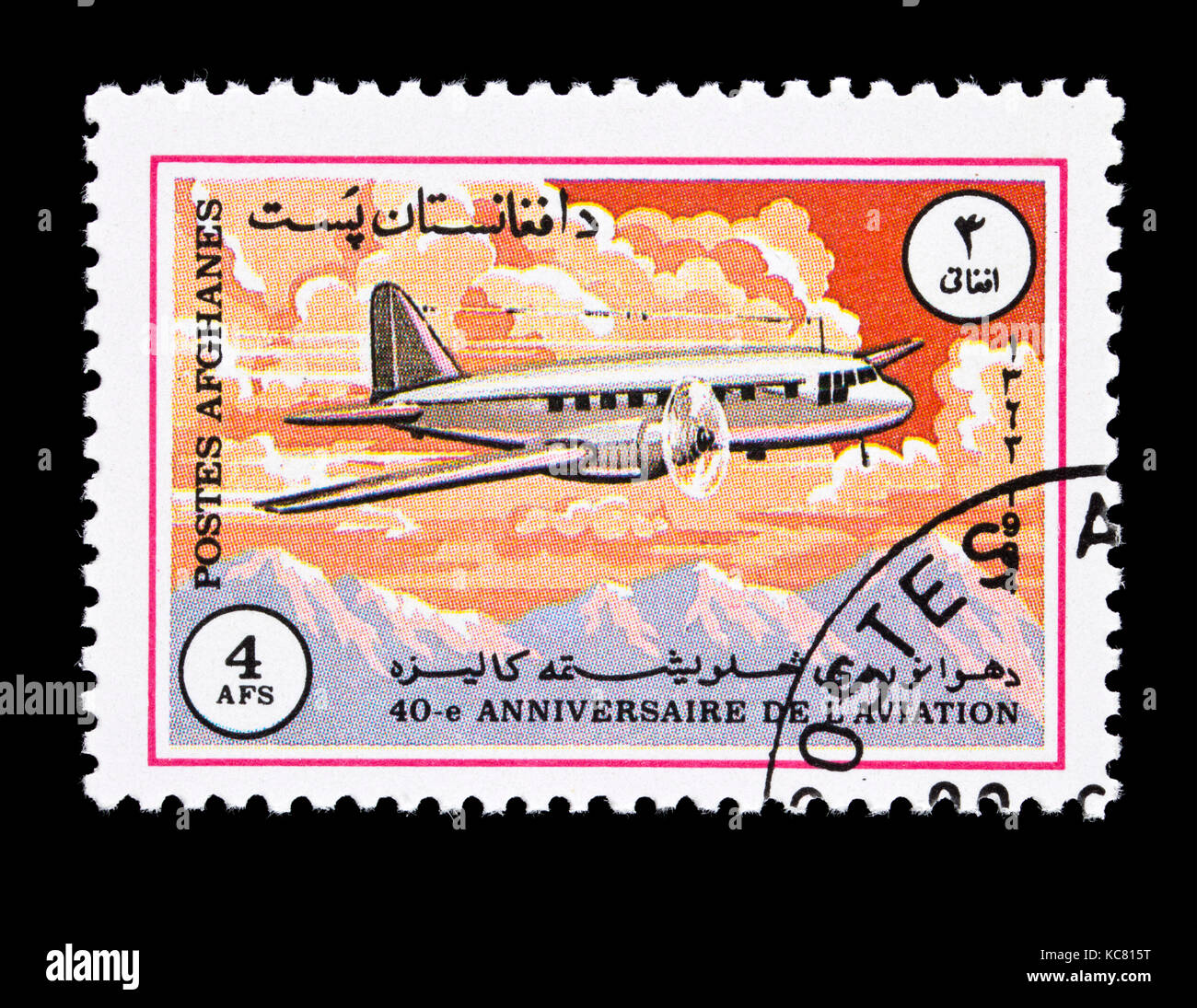 Briefmarke aus Afghanistan, das eine Iljuschin IL-12 der Sowjetischen zivilen Flugzeug. Stockfoto