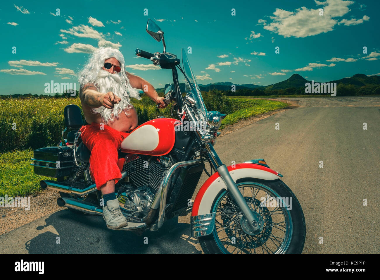 Weihnachtsmann auf dem Motorrad Stockfoto