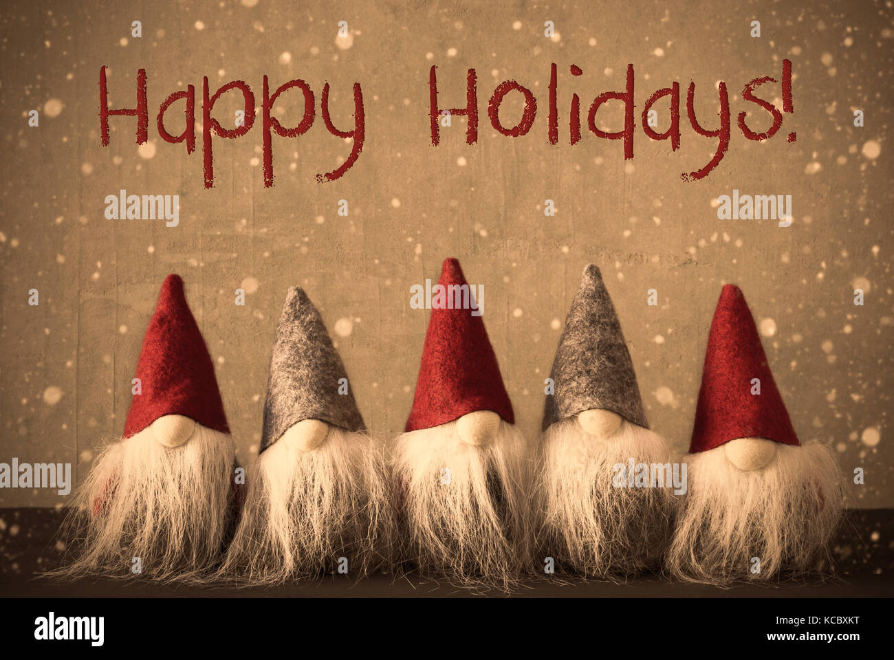 Gnome, Schneeflocken, Text frohe Feiertage Stockfoto