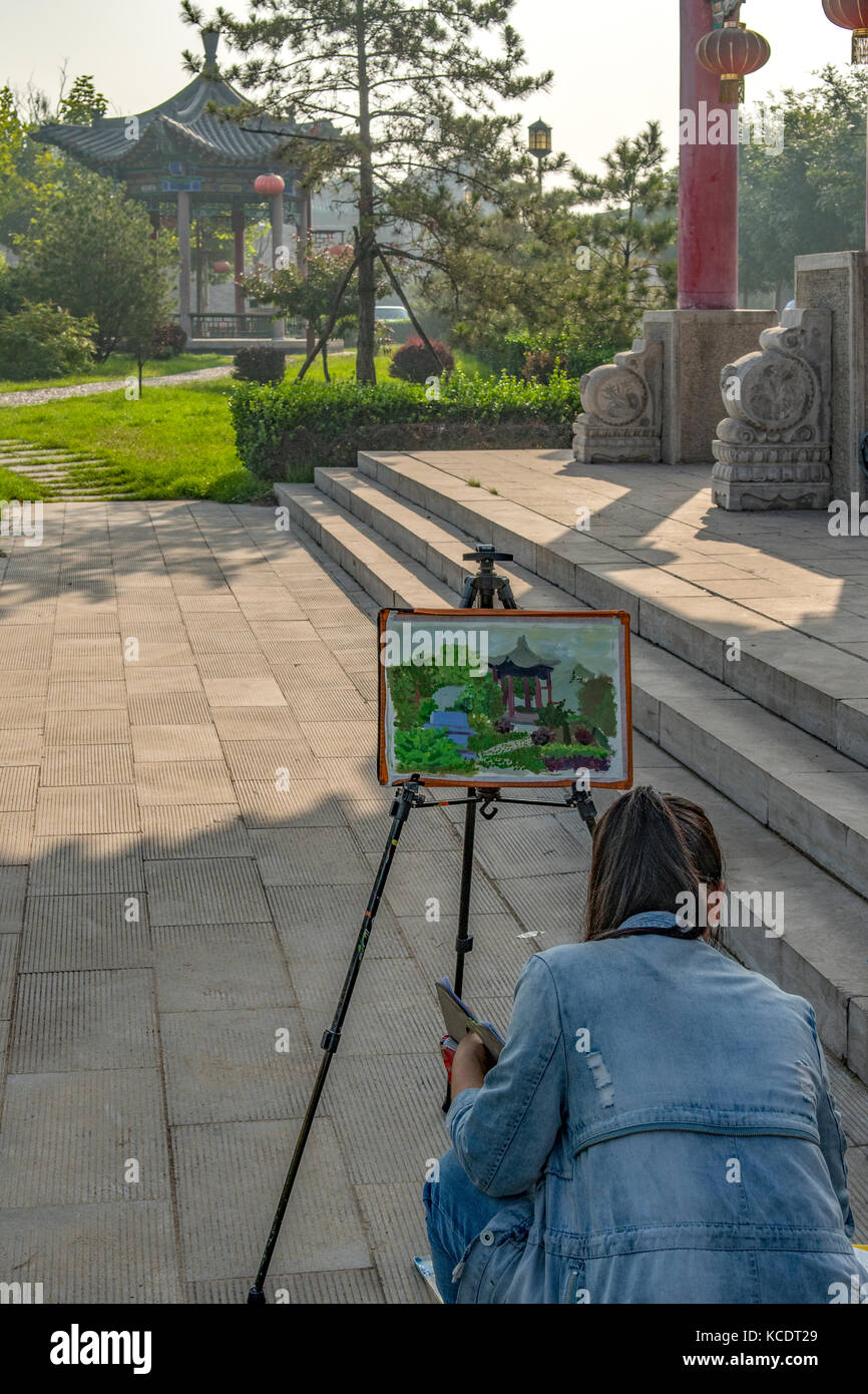 Künstler Malerei im Osten von Alte Stadt von Pingyao, Shanxi, China Stockfoto
