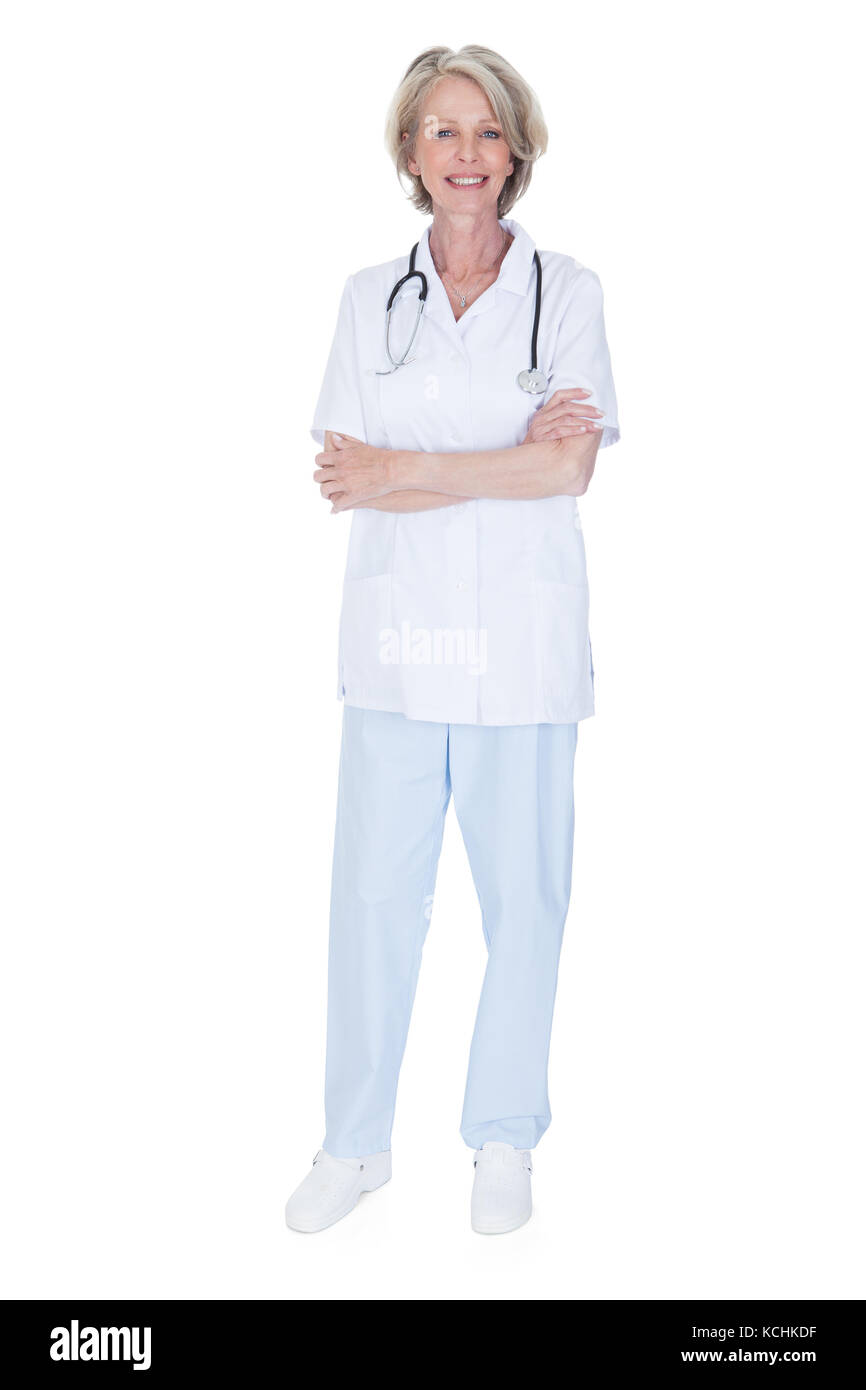 Porträt von glücklich Reife Frau Doktor Isolated Over White Background Stockfoto Porträt von glücklich Reife Frau Doktor Isolated Over White Background Stockfoto