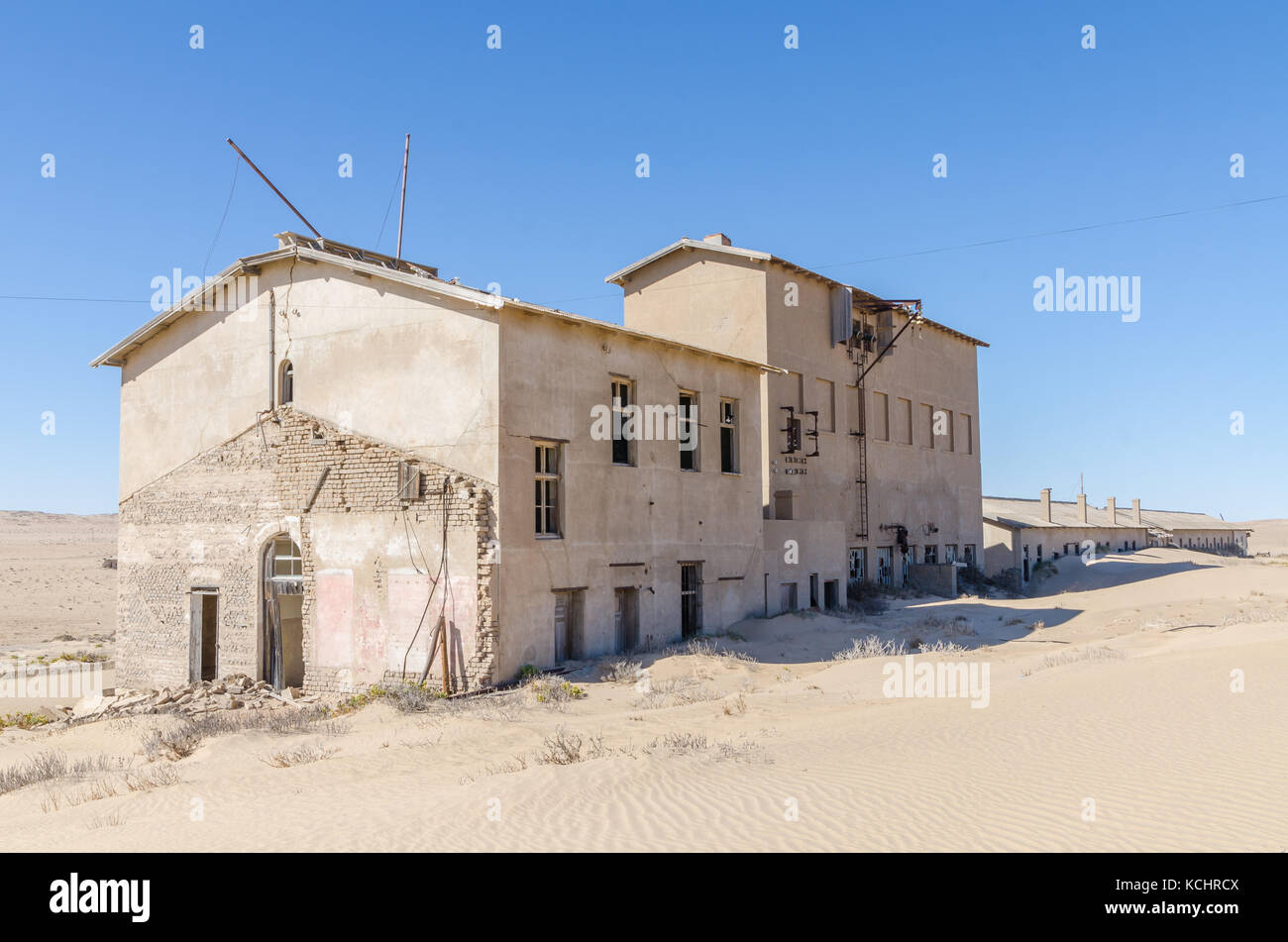 Ruinen der einst wohlhabenden deutschen Bergbau Stadt Kolmanskop, die in der Wüste Namib in der Nähe von Lüderitz, Namibia, Südafrika Stockfoto