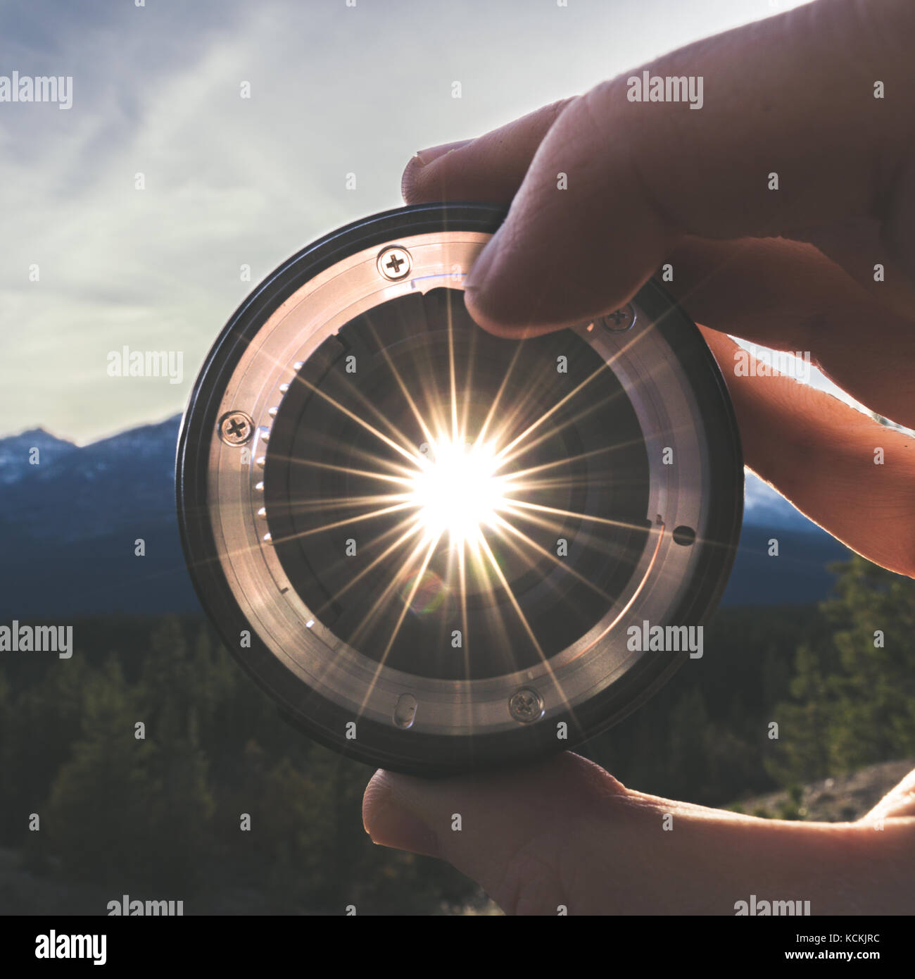 Sonnenuntergang durch eine Kameralinse Stockfoto