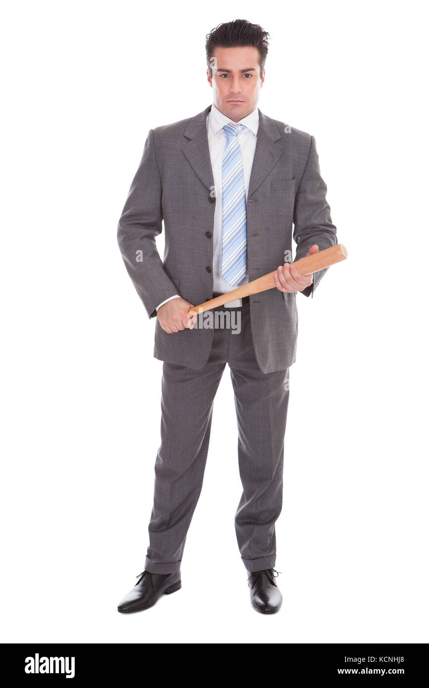 Porträt des jungen Geschäftsmann hält Baseballschläger Over White Background Stockfoto