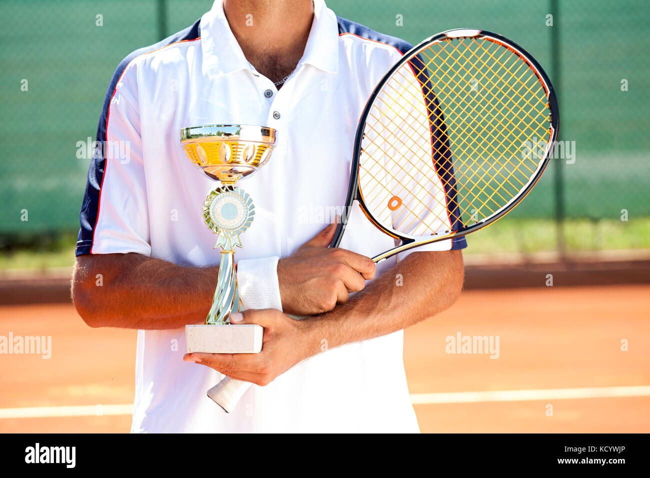 Tennis Player mit goldener Pokal Stockfoto