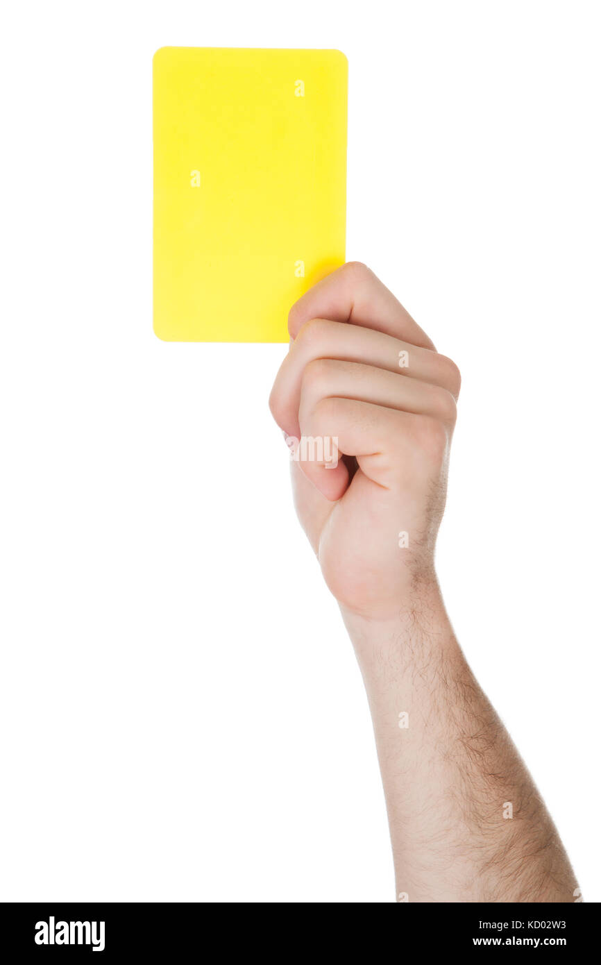 Nahaufnahme des männlichen Fußball Schiedsrichter Hand, die gelbe Karte Stockfoto