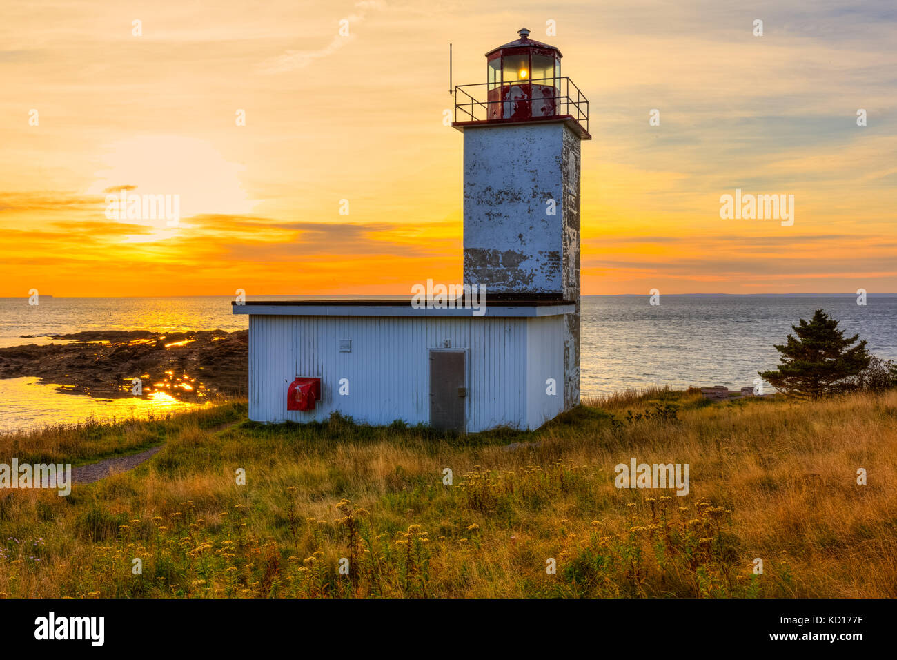 Sunrise, quaco Head Lighthouse, Bucht von Fundy, New Brunswick Kanada Stockfoto