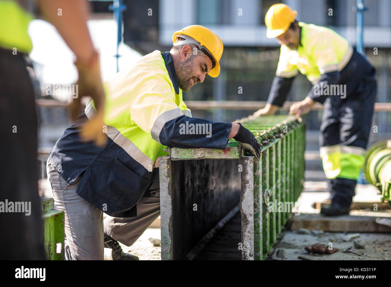 Bauarbeiter auf der Baustelle Stockfoto