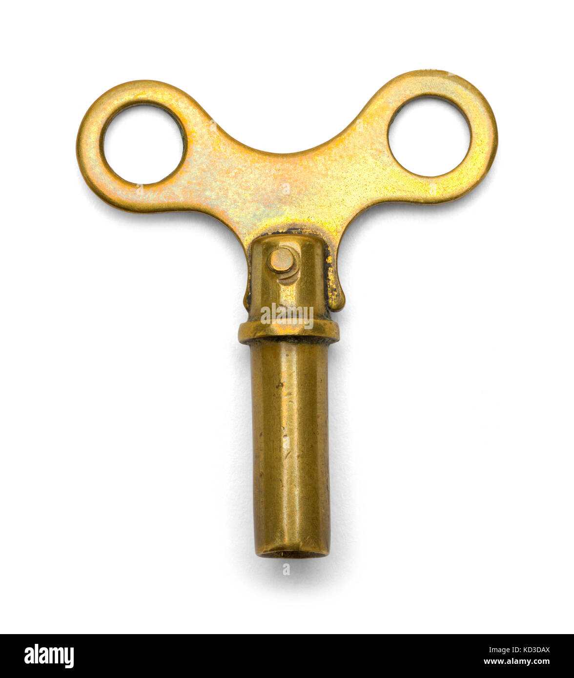 Messing Uhr Schlüssel auf einem weißen Hintergrund. Stockfoto