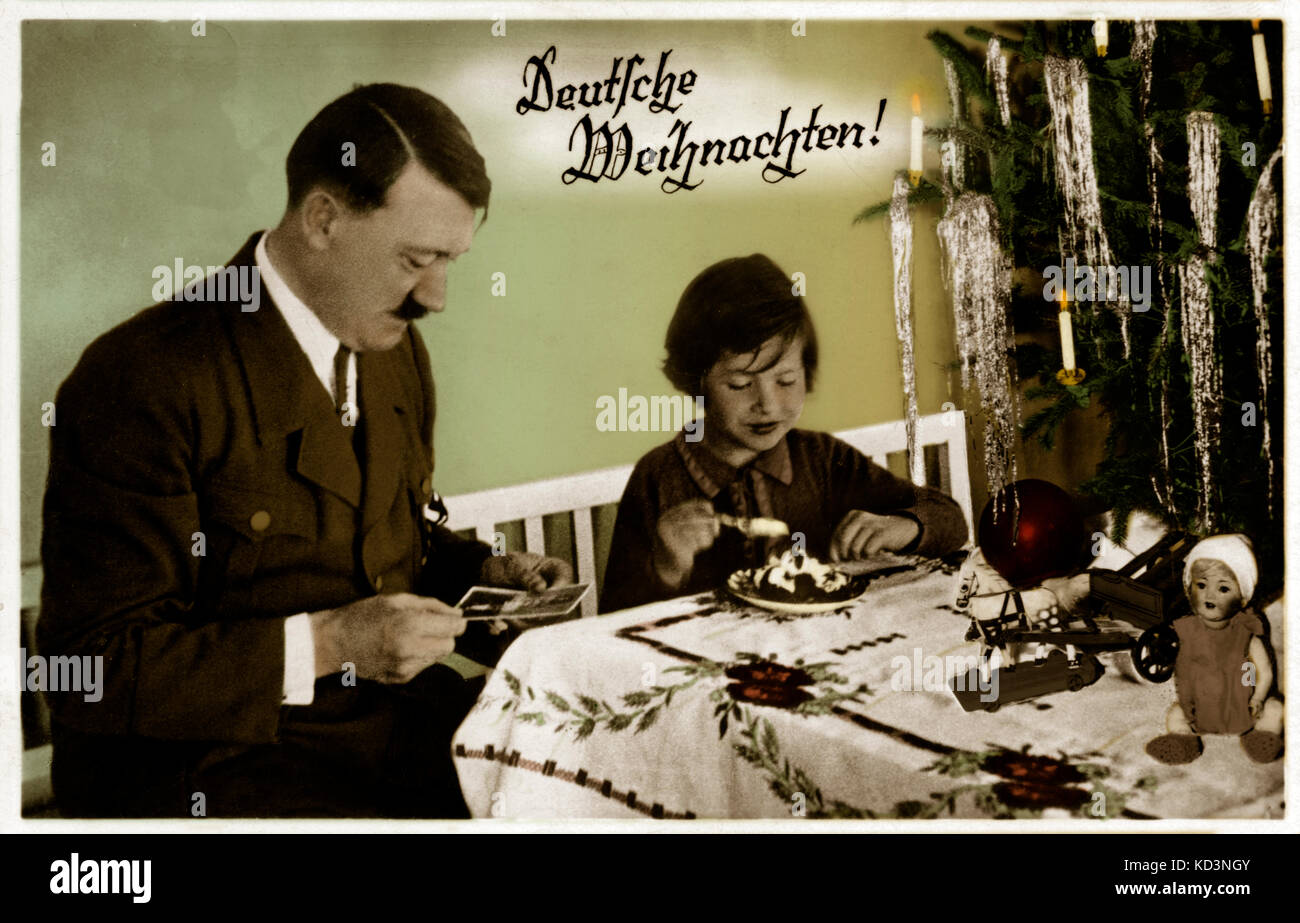 Adolf Hitler mit Kind. Österreichische deutsche Politikerin und Parteivorsitzende der Nationalsozialistischen Deutschen Arbeiterpartei: 20. April 1889 - 30. April 1945 (Bundeskanzler von 1933 bis 1945). Bildunterschrift lautet: "Deutsche Weihnachten!" ('Deutsche Weihnachten!') Stockfoto