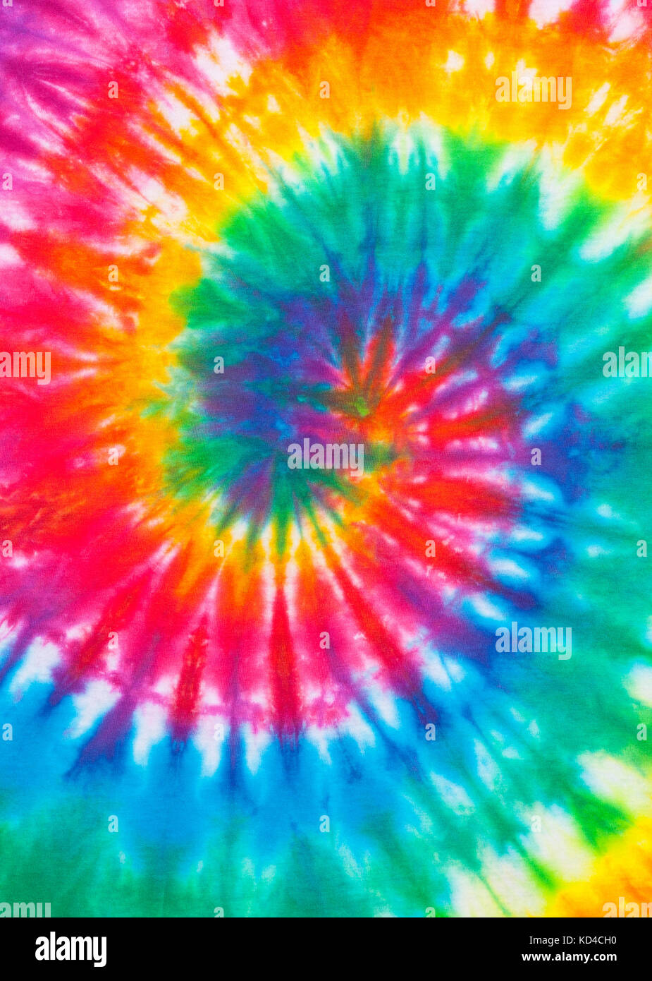Tie Dye rainbow spiralförmige Muster Nahaufnahme. Stockfoto